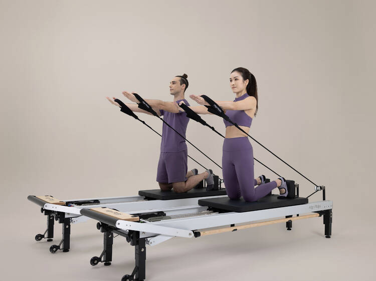 Hop on the reformer pilates machines and redefine your form with PURE